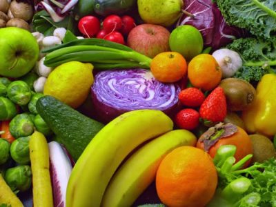 gettyimages-1301396194-640×640 Slow motion medium high angle locked down shot of a mix of different fruits and vegetables rotating on a platter. Shot in Slovenia.